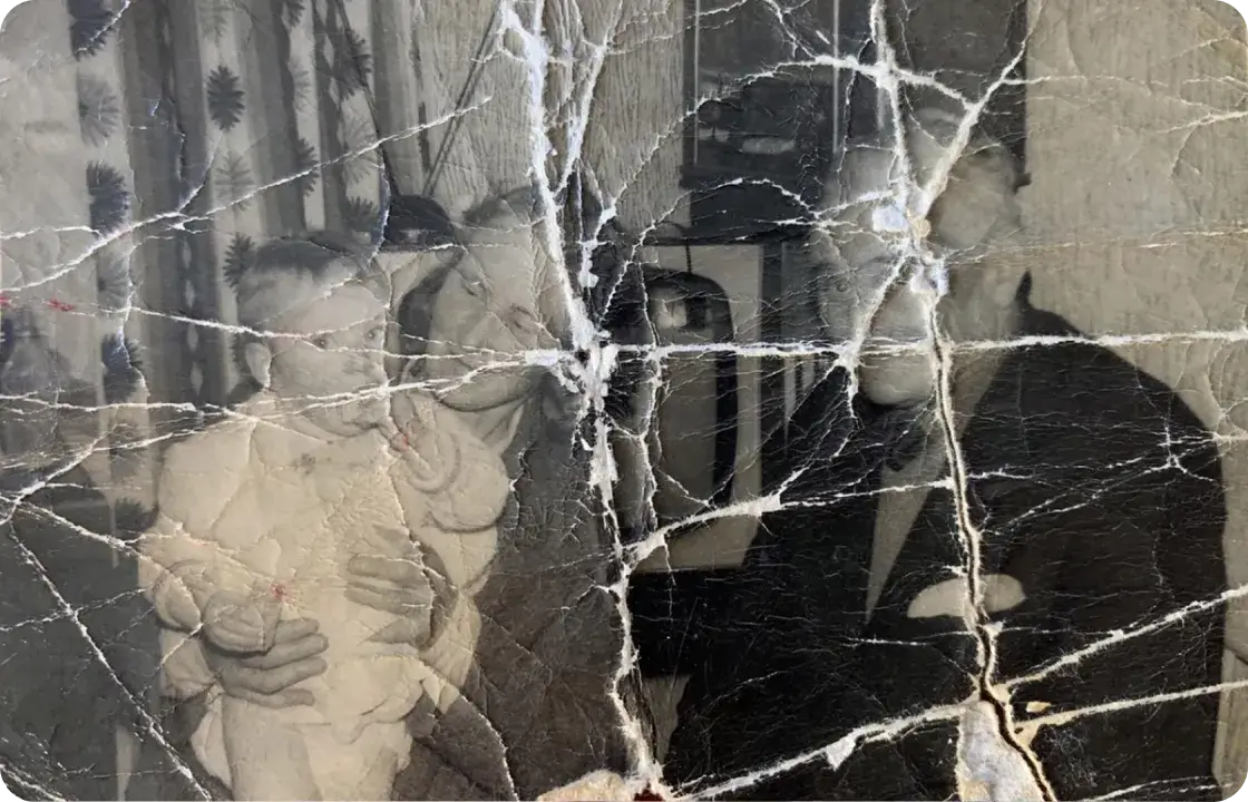 badly damaged old family photo